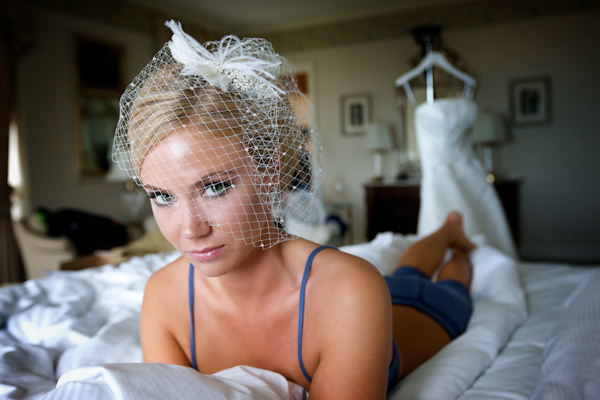 wedding photo by Bob and Dawn Davis Photography, beautiful bride, getting ready, birdcage veil 